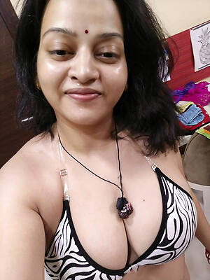 grown-up indian milf carry the posing nude