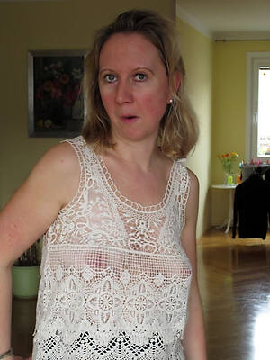 British erotic mature lassie shows off everything