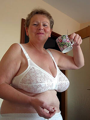 mature women in bra teasing us