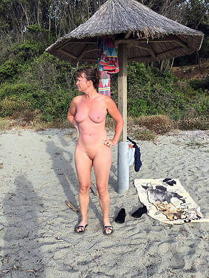 bungling naked mature on beach xxx